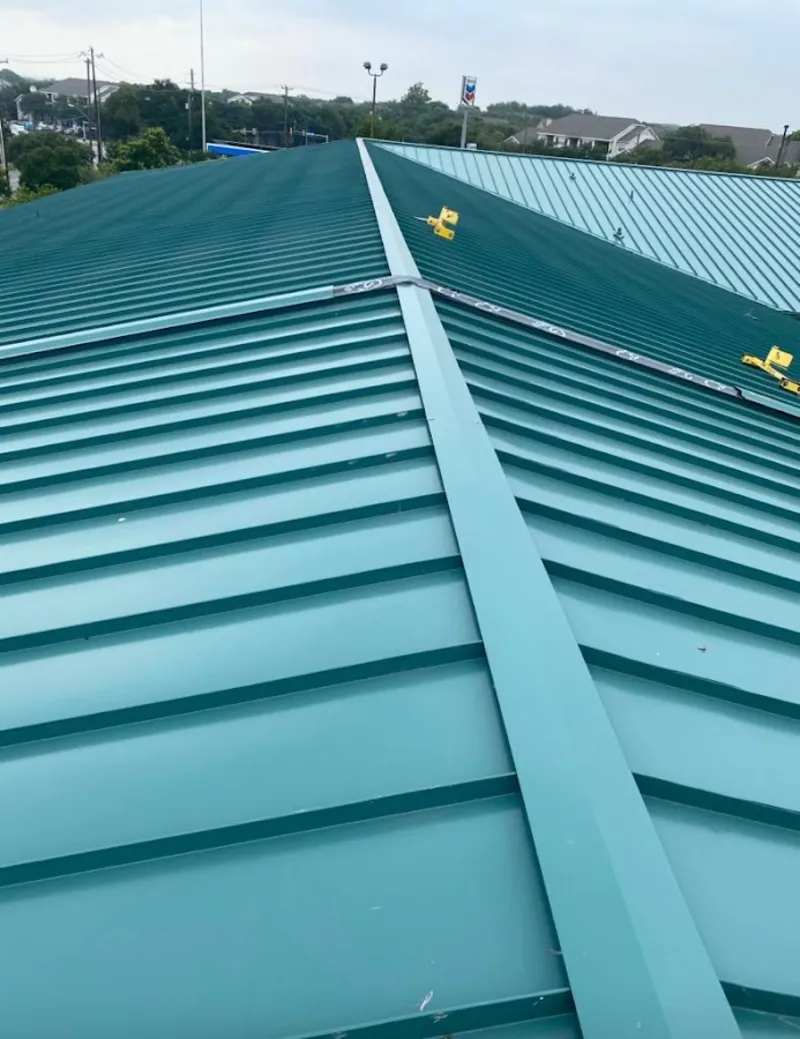 Green commercial metal roof ridge and valley for Metal Roof Repair in Seaside